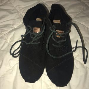 Black Tim’s moccasin booties